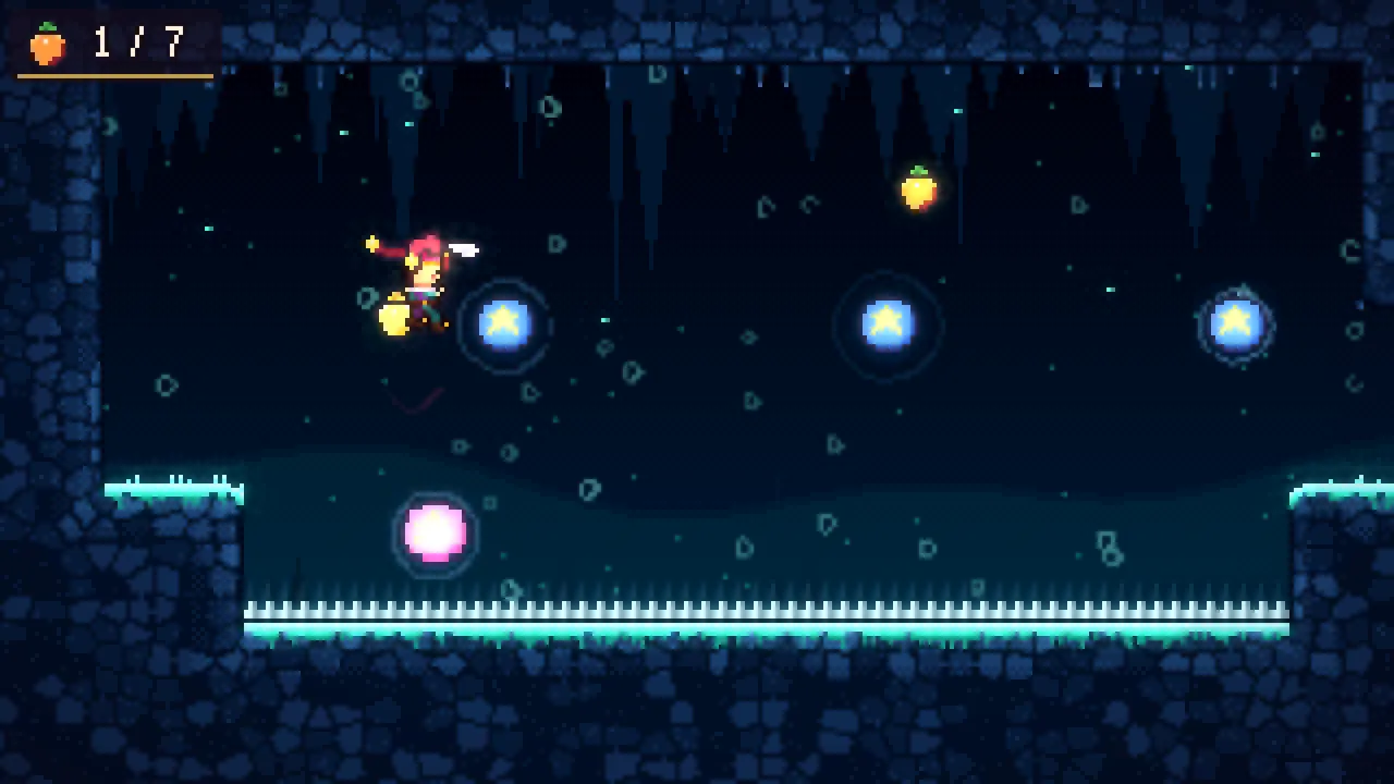 Undertow: glowing pinball bumpers in a dark cave above a spike floor.